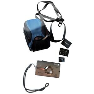 Olympus SP-700 6.0MP Digital Camera Bundle w/Lowepro Case xD Card 2 Battery